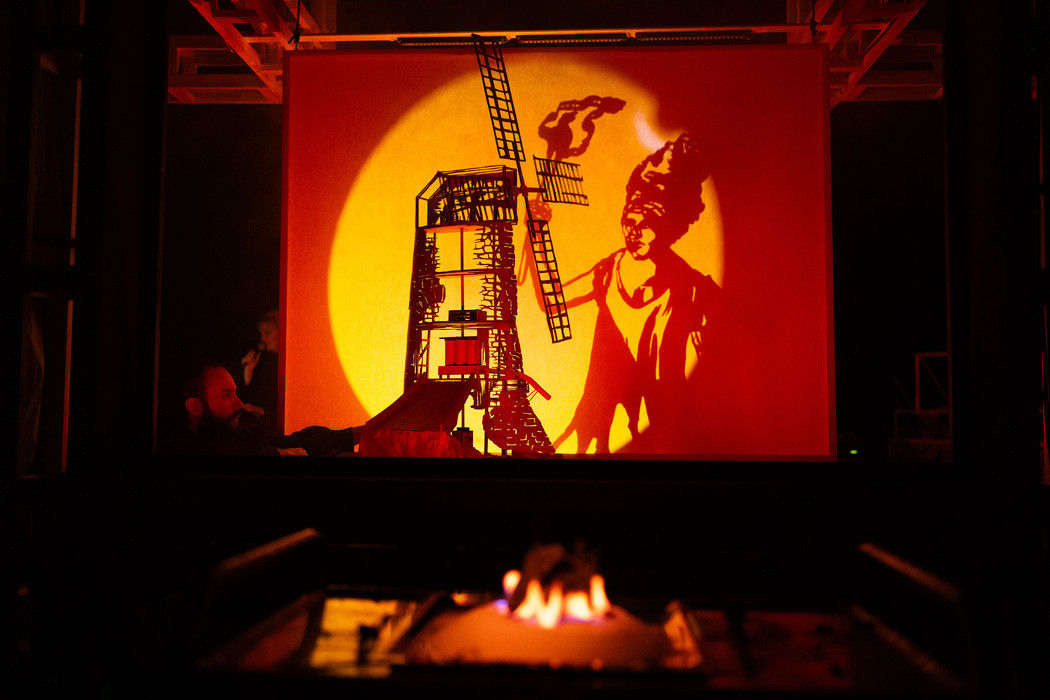 A documentation photo of a theatre play imitating a puppet show of sorts. 