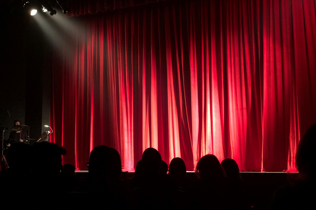 Curtain call, stage for performing arts. 